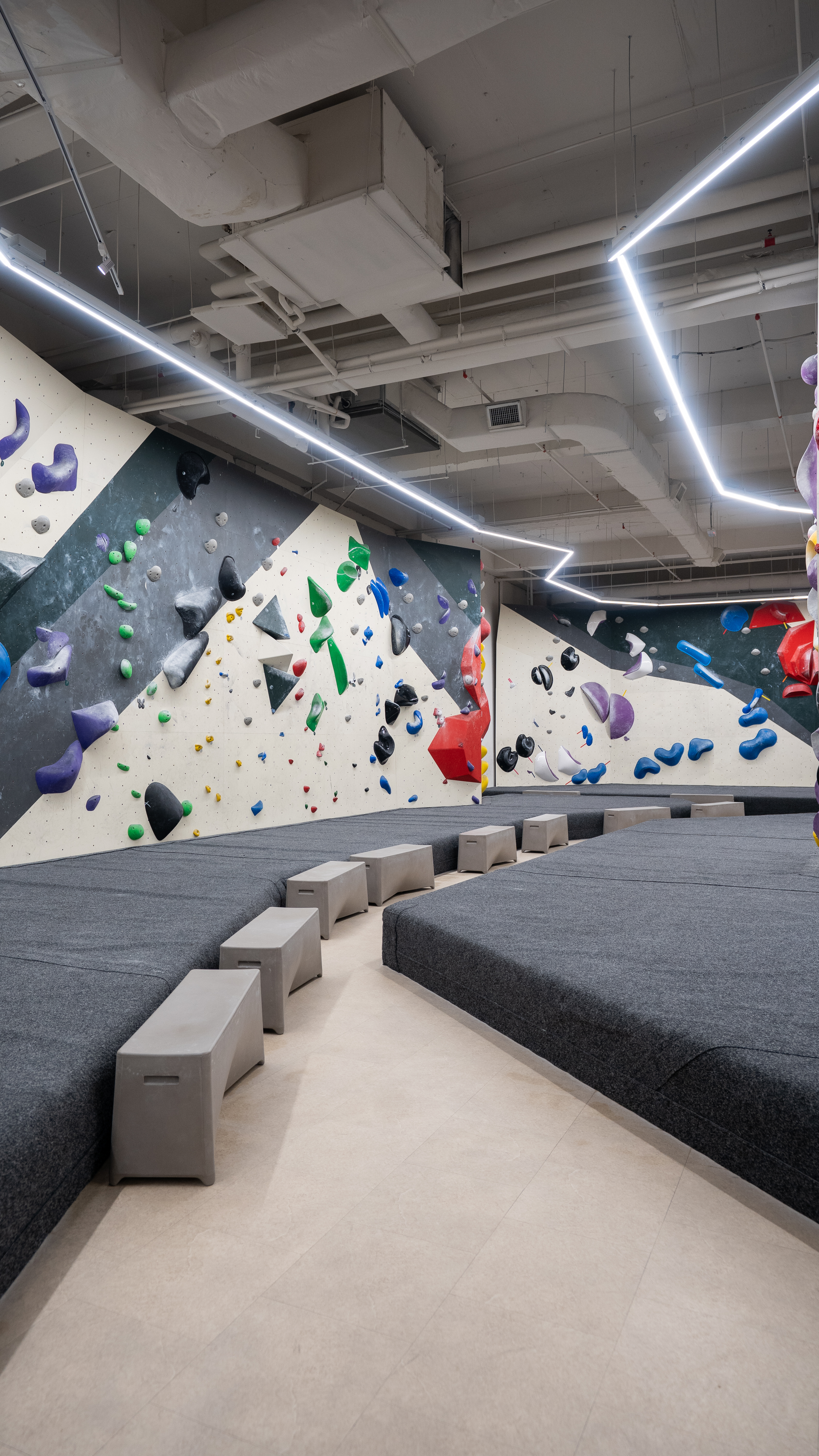 Interior of a modern bouldering gym.